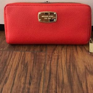 Michael Kors Large zip around wallet.
